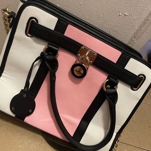 Pink black and white purse